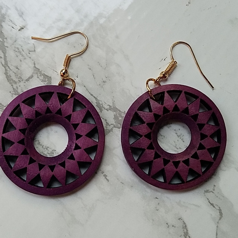 Purple sunburst round laser cut wooden earrings
